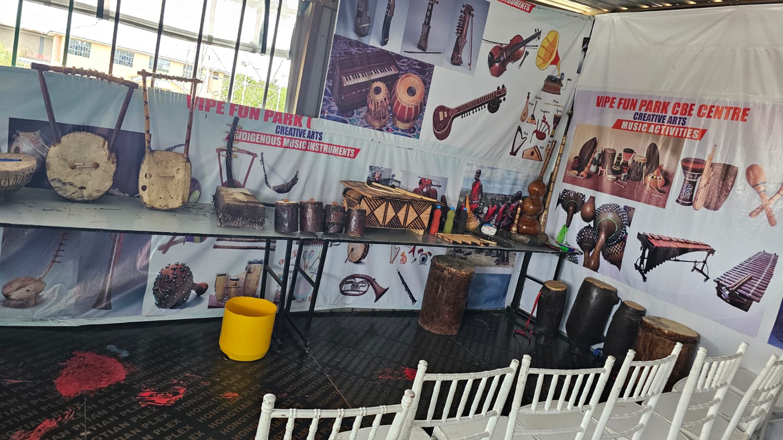 Indigenous Kenyan drums, lyres and shakers arranged in the CBE Centre music activities area