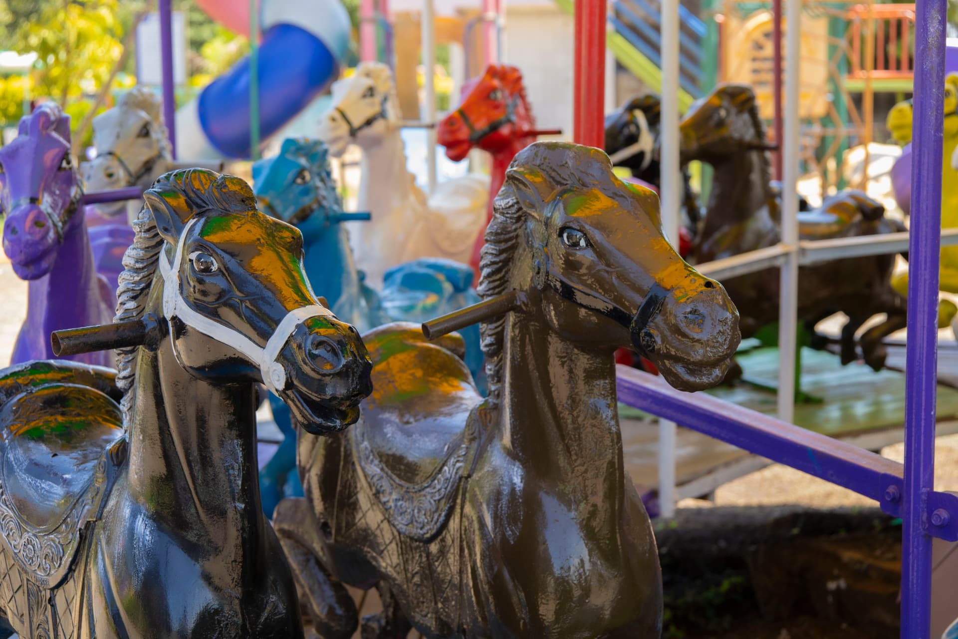 Hand-painted carousel horses at Vipe Fun Park